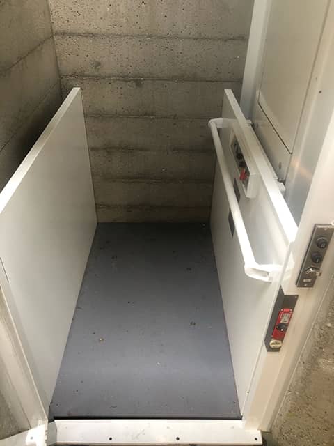 Outdoor Enclosed Wheelchair Lift - Bottom Door Open