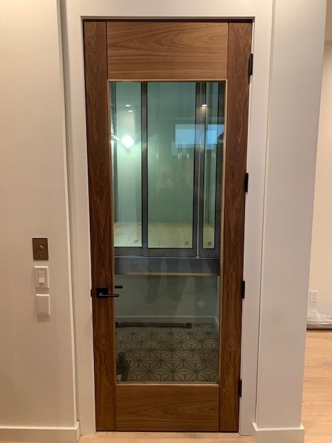Glass Elevator with Wooden Finishes installed in California by Diamond Elevator