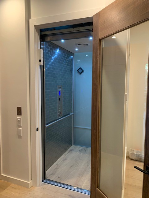 Glass Home Elevator interior installed by Diamond Home Elevator in California