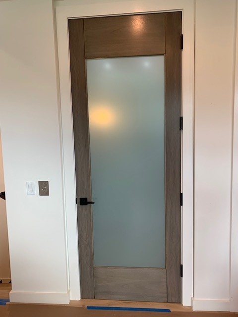 Glass Elevator with frosted finishes installed in California