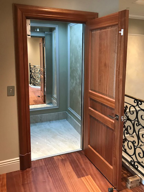 Home Elevator in San Francisco - Marble Interior Door Open Mirror