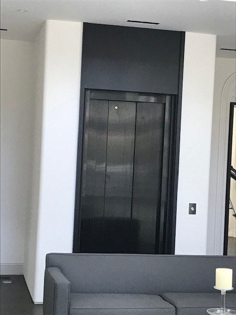 Custom Savaria Residential Elevator Black Doors