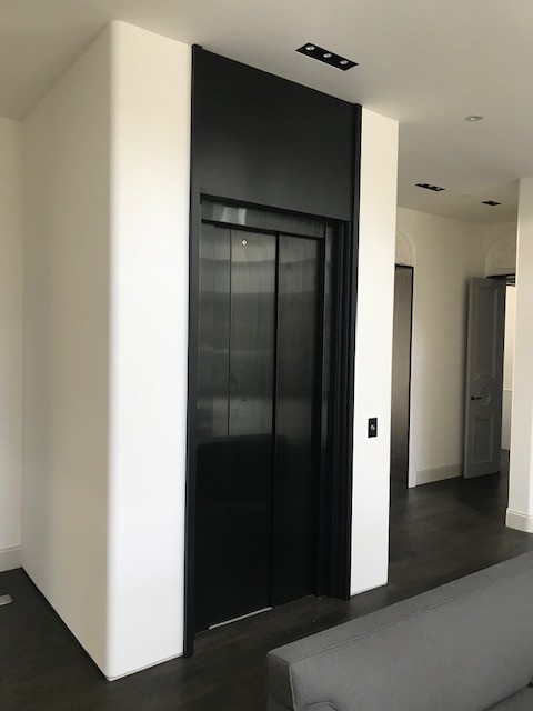 Custom Savaria Residential Elevator Black Doors Closed