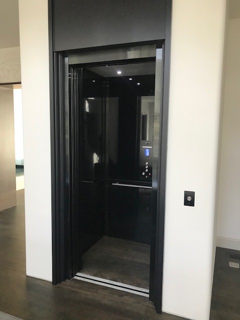 Custom Savaria Residential Elevator Black Doors Open