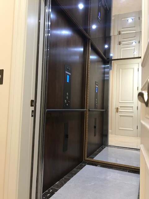 Eclipse Home Elevator in Los Angeles - Raised White Panel Cab