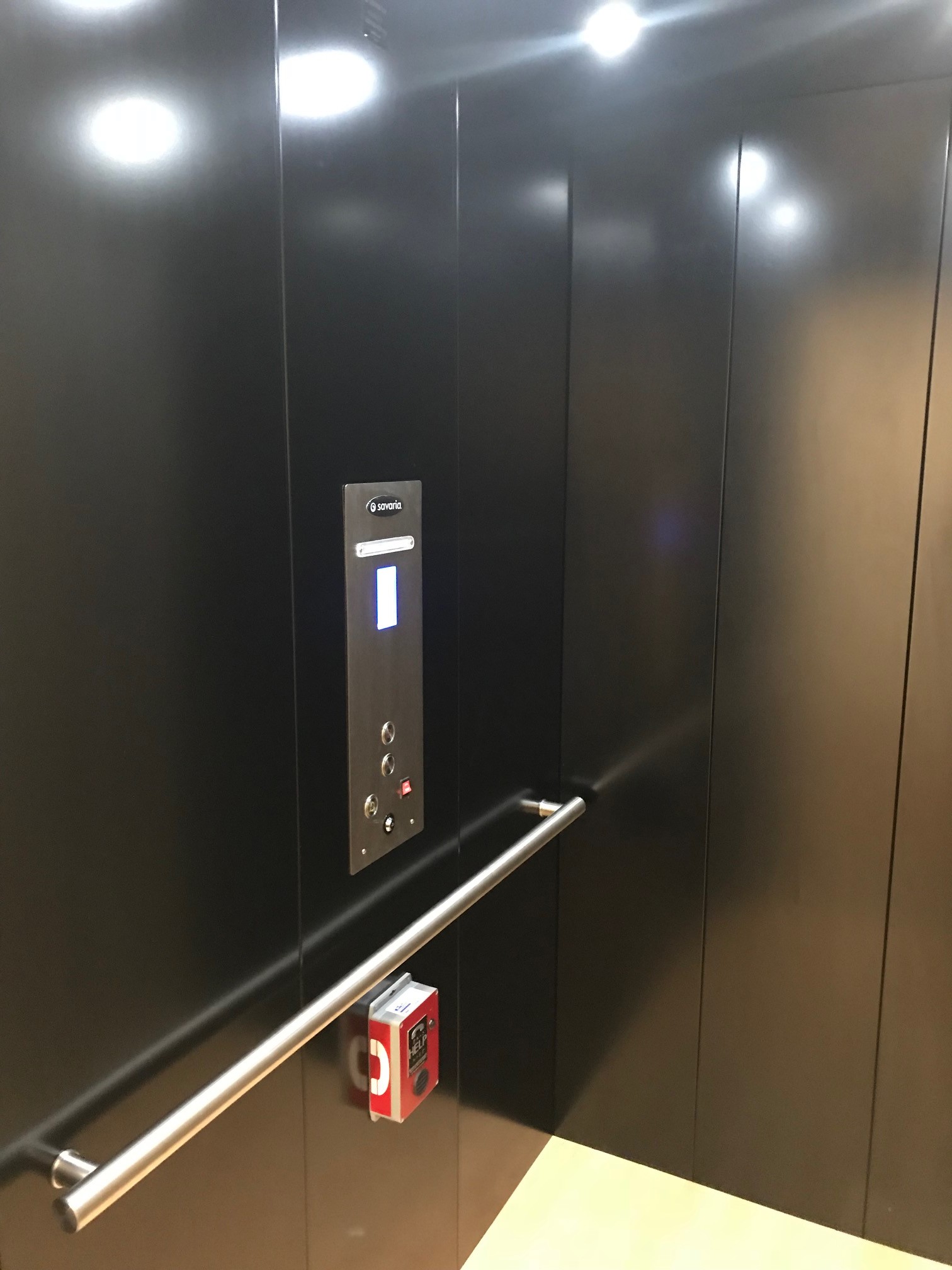 Custom Black Elevator with Silver Buttons