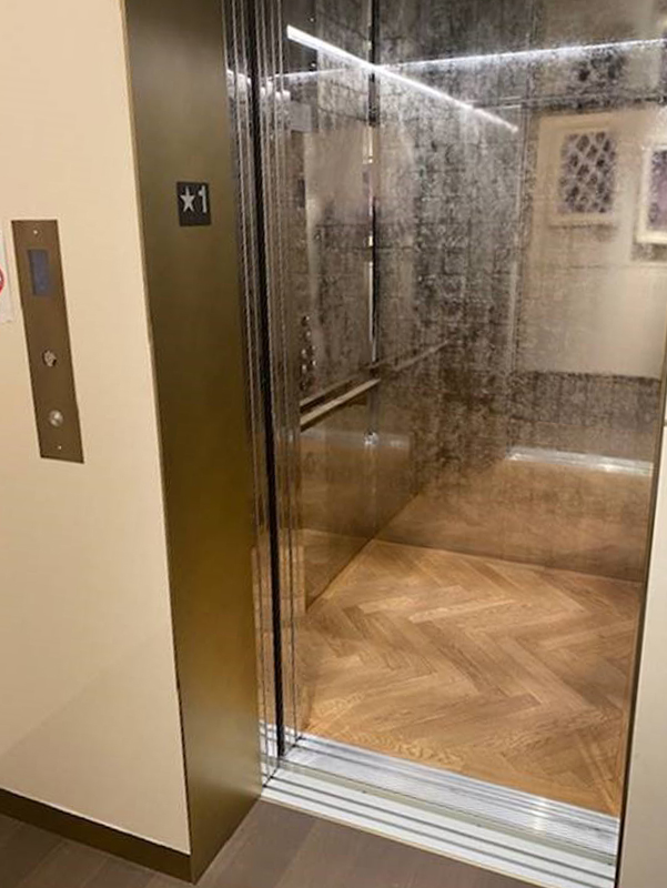 LULA Elevator - Frosted Interior Doors Open