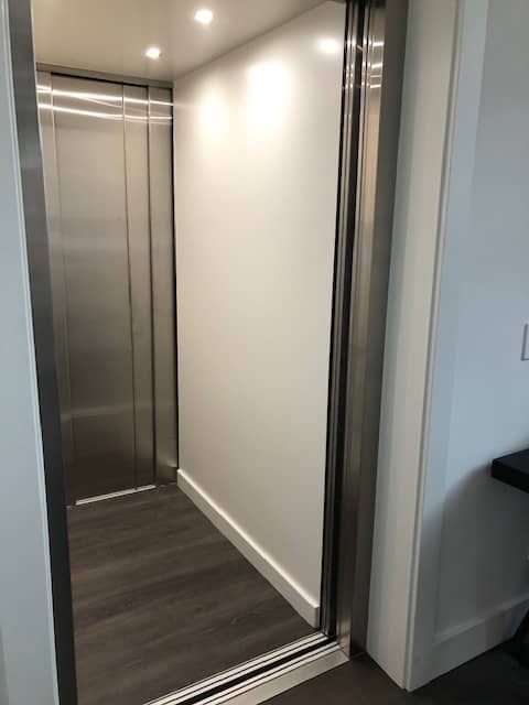 LULA Commercial Elevator - Stainless Steel Doors Open
